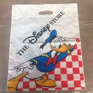 The Disney Store plastic store merchandise bag.